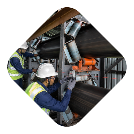 Pipe conveyor belt rotation and alignment